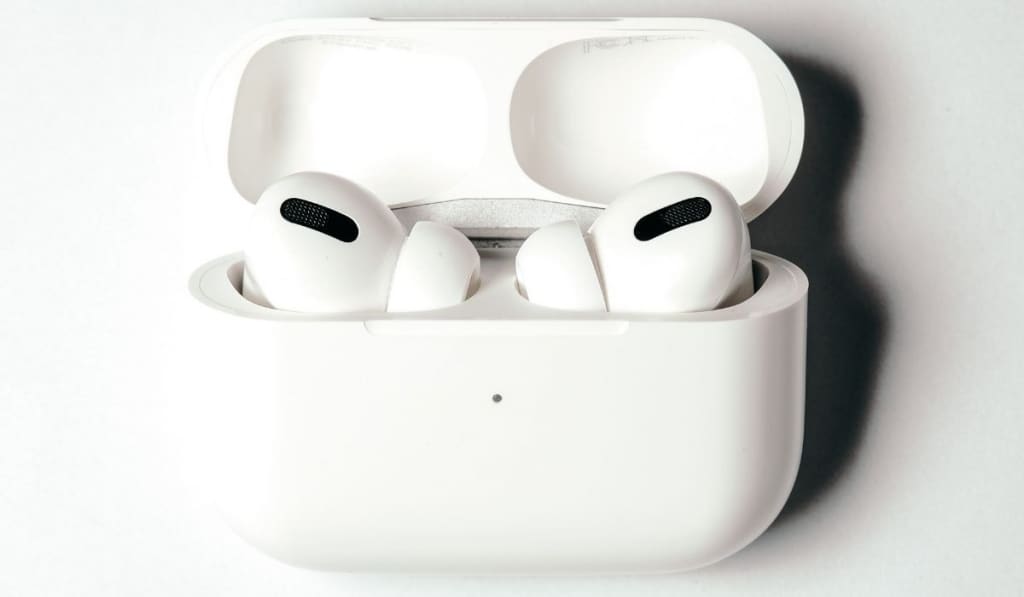 Airpods Pro with case in white background