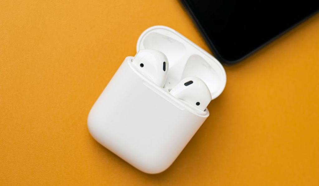 Airpods in yellow background 