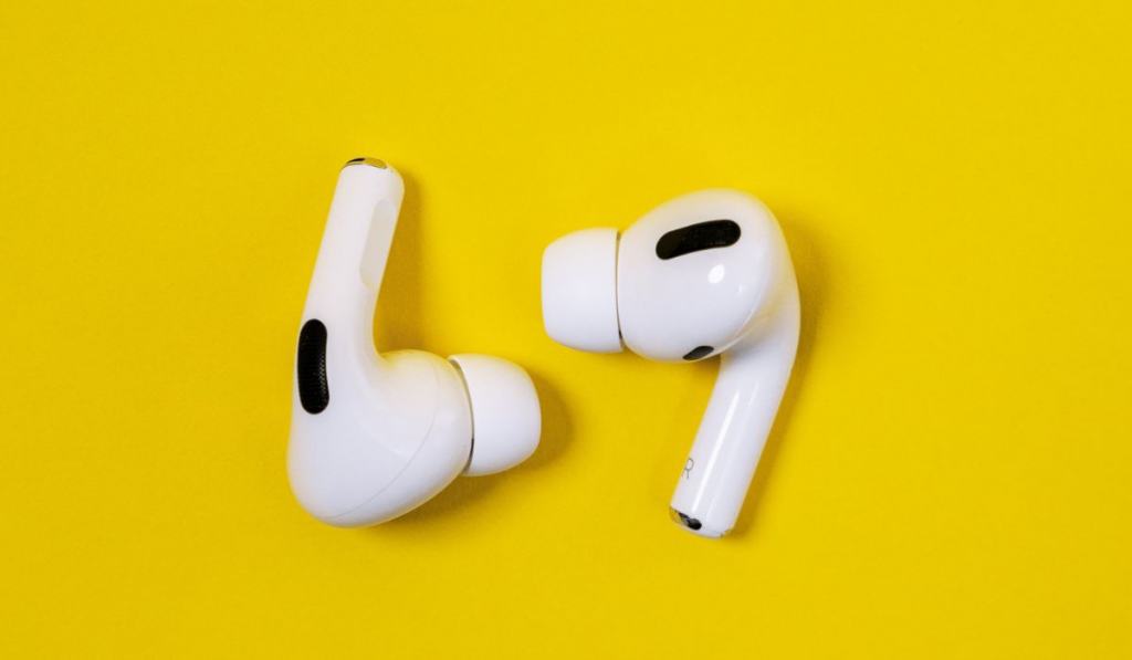 Apple AirPods Pro on a yellow background 