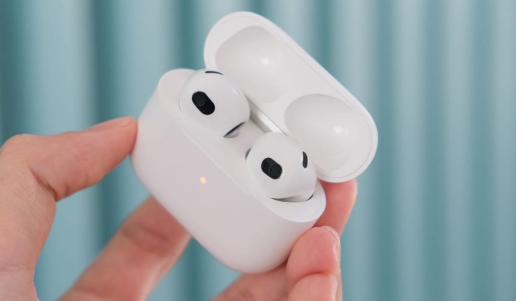 Apple Airpod 3 in womans hand
