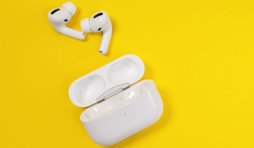 New unpacked wireless headphones Apple AirPods Pro with opened rechargeable case on