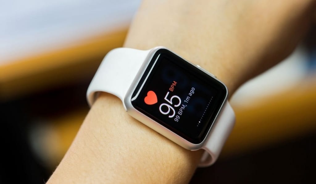 Close up white smart watch with health app