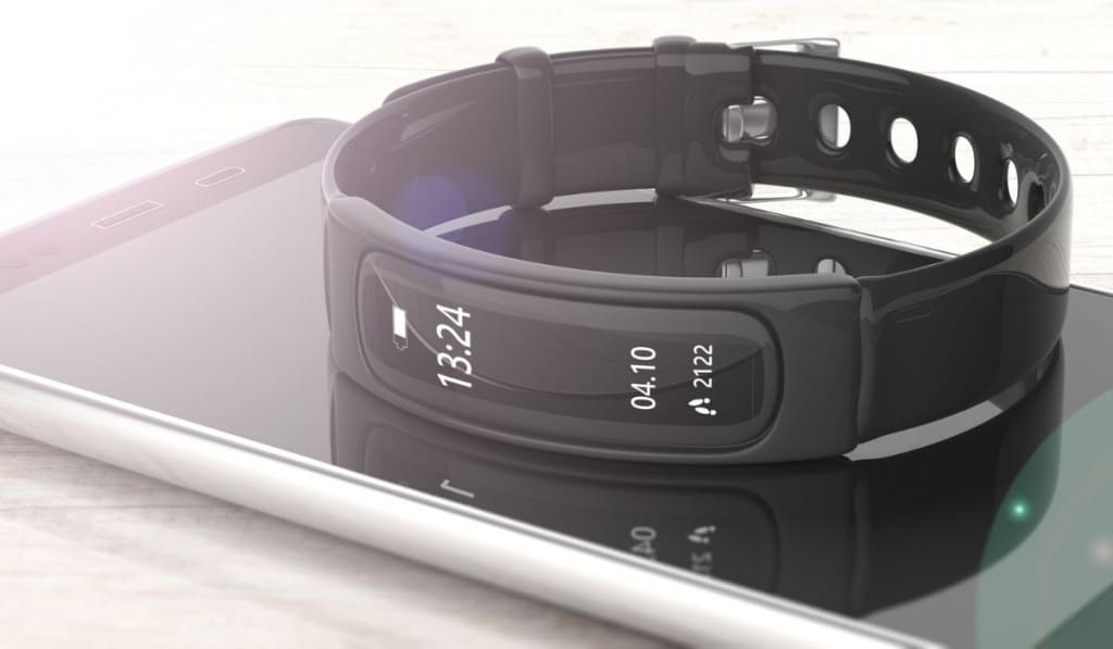 Fitness tracker, smart watch and mobile phone on white background 
