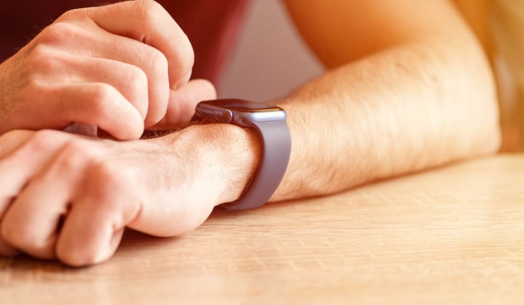 Male hand with a wrist smart apple watch