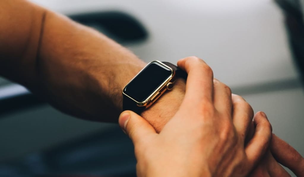 Man use his smart watch in aircraft 