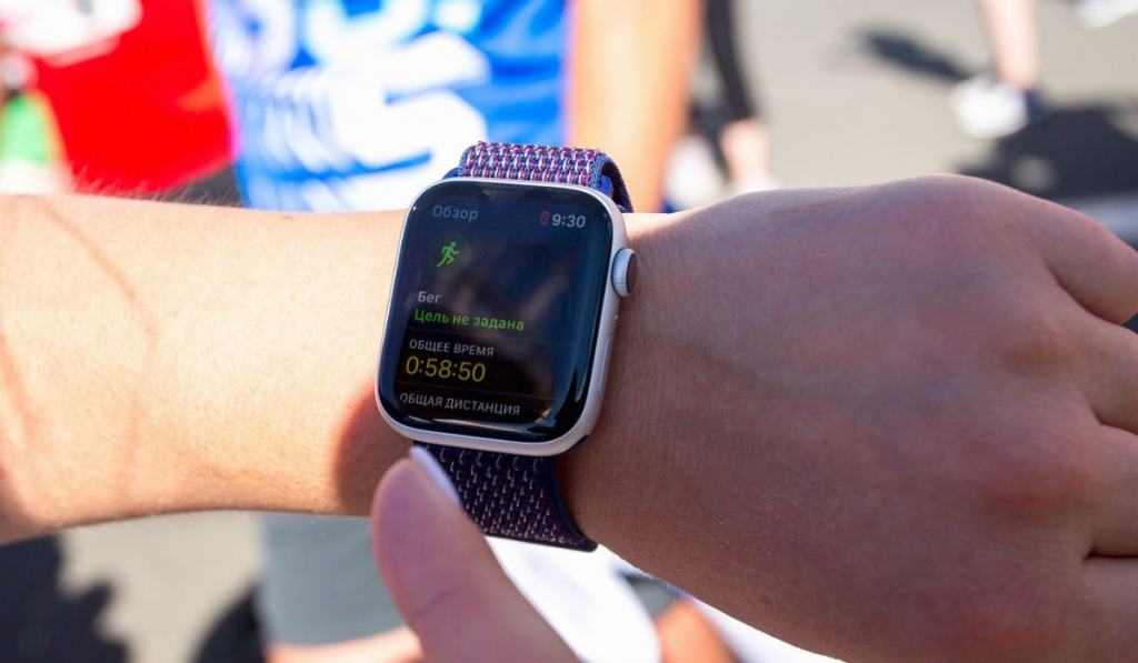 Sports watch on the hand of a runner