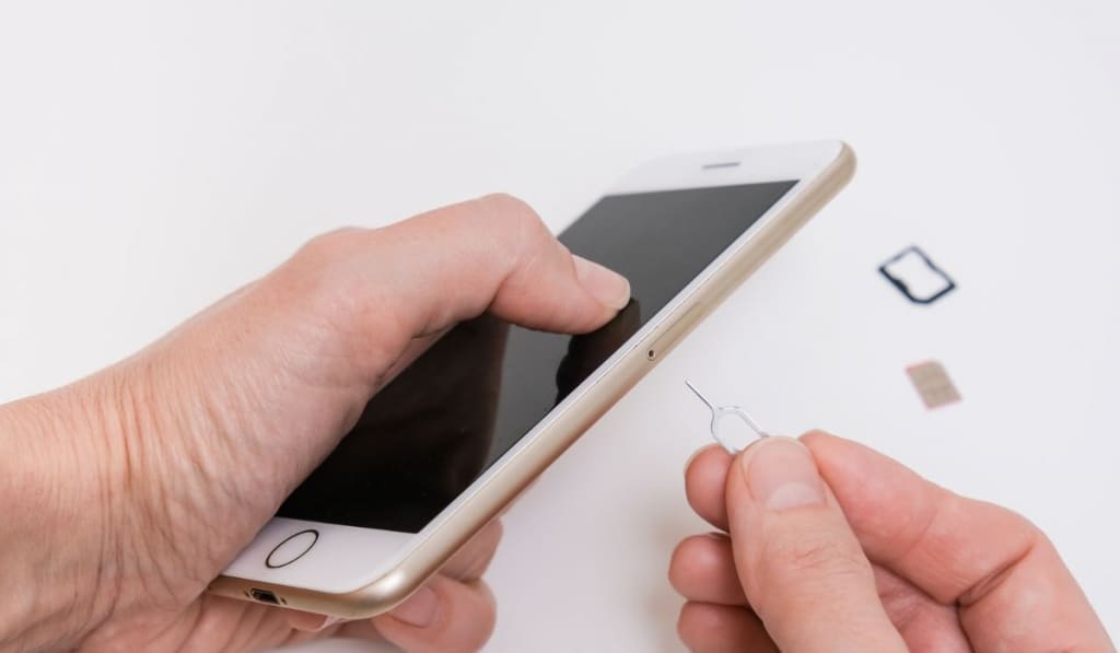 Removing a sim card out of a smartphone
