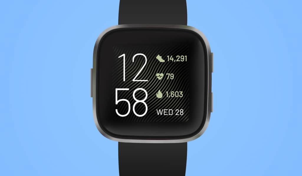 Fitbit Versa 4 on blue background